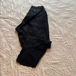Lululemon leggings, black camo, scalloped at ankle. EUC